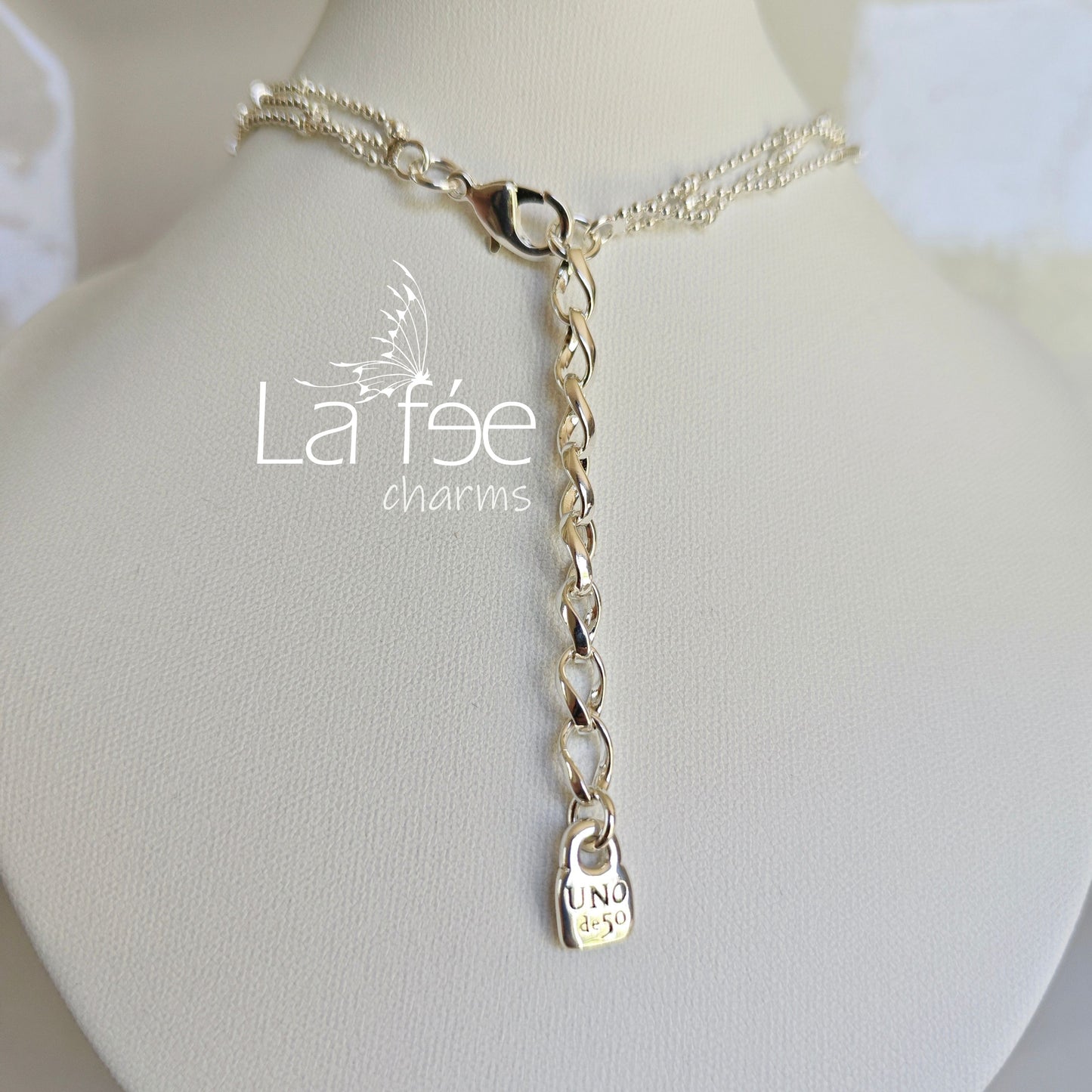 Collar Triple Turquesa UNO/50