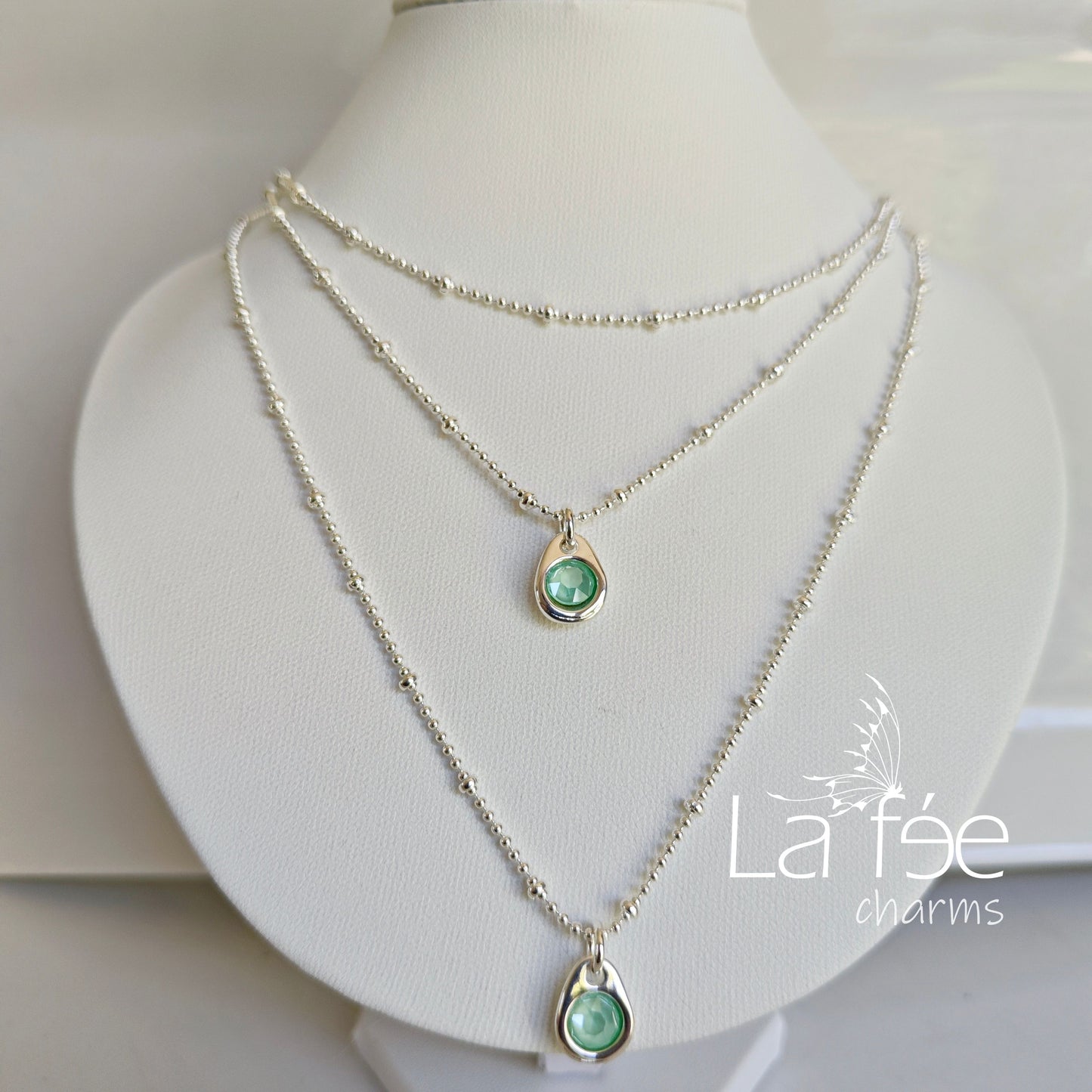 Collar Triple Turquesa UNO/50