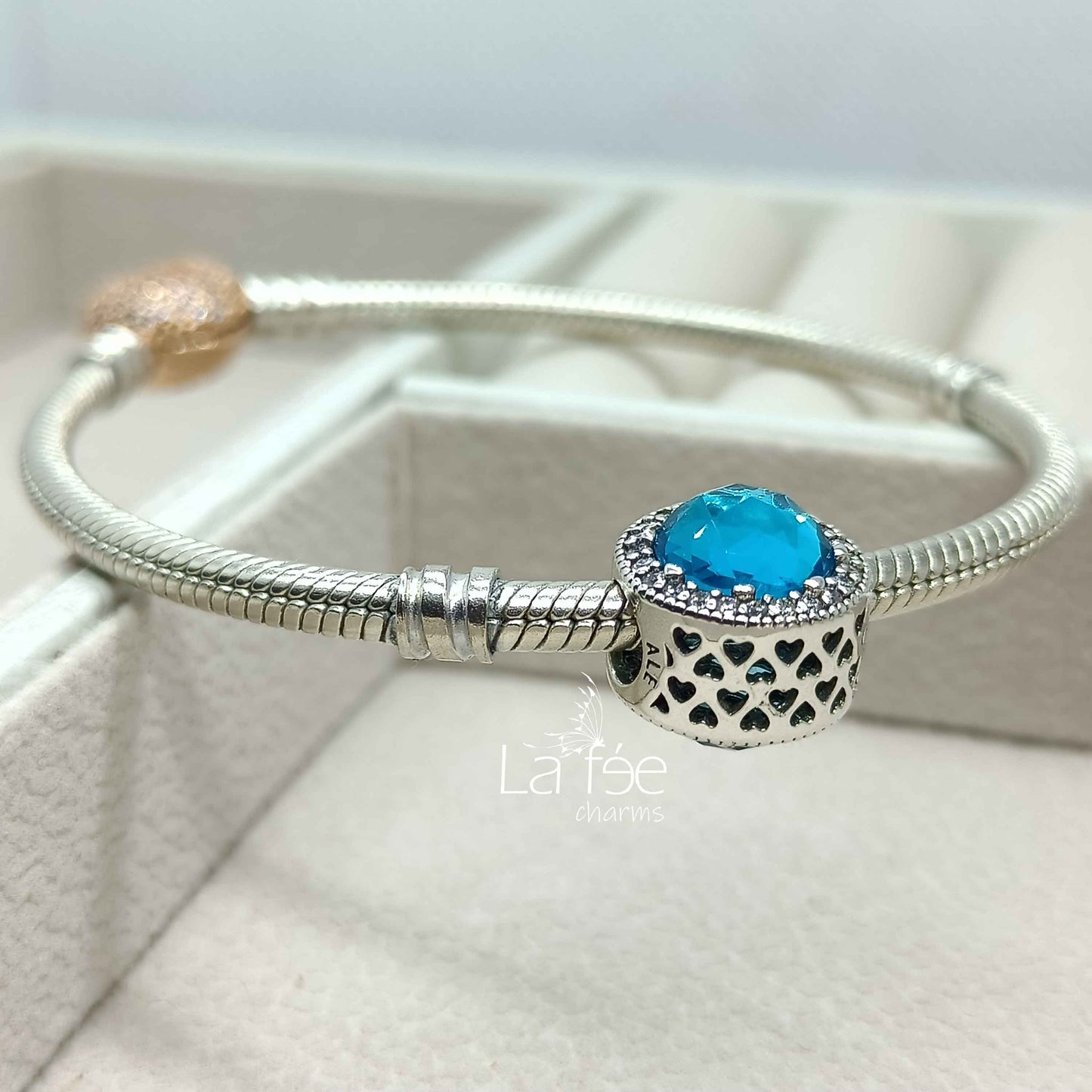 Charm Corazones Cristal Celeste