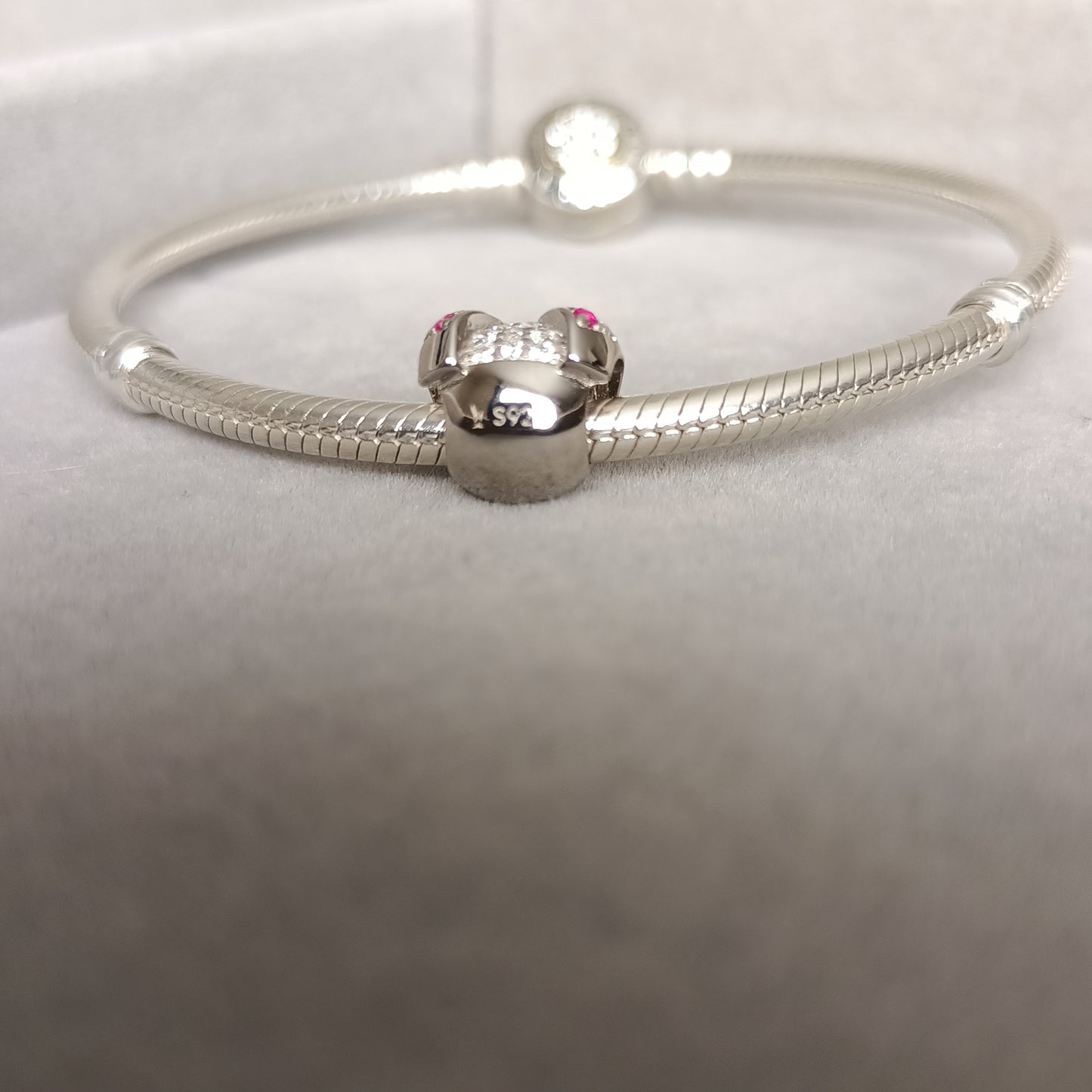 Charm Chinita Zircones Rosa