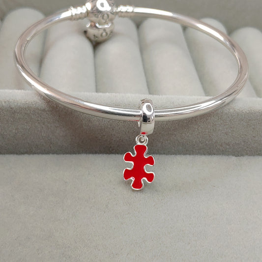 Charm Pieza de Puzzle Rojo (TEA)