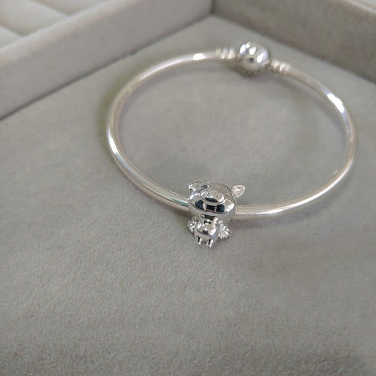 Charm Cerdito con Alas