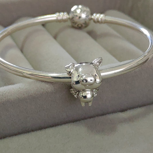 Charm Cerdito con Alas