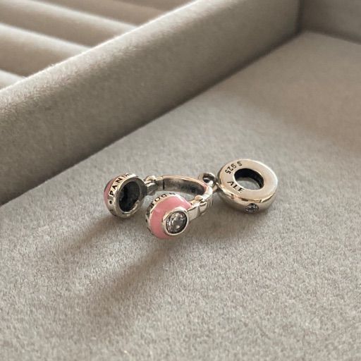 Charm Audífonos Rosa